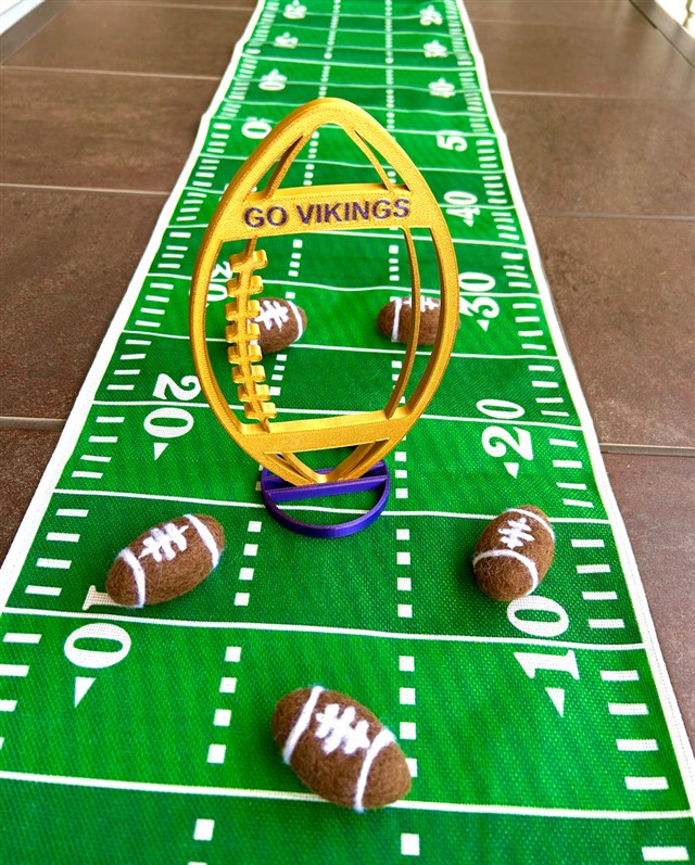 3D printed football centerpiece in team colors